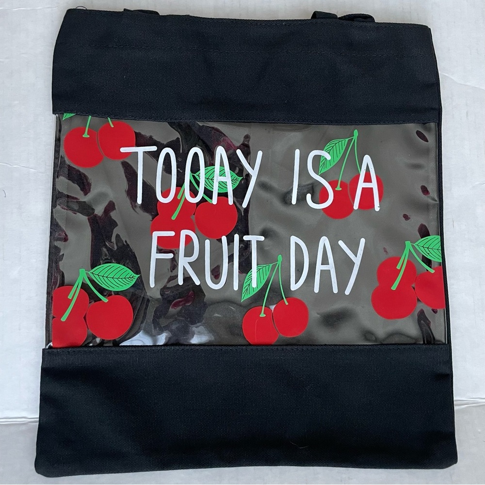 Unisex Black tote bag with cherries.